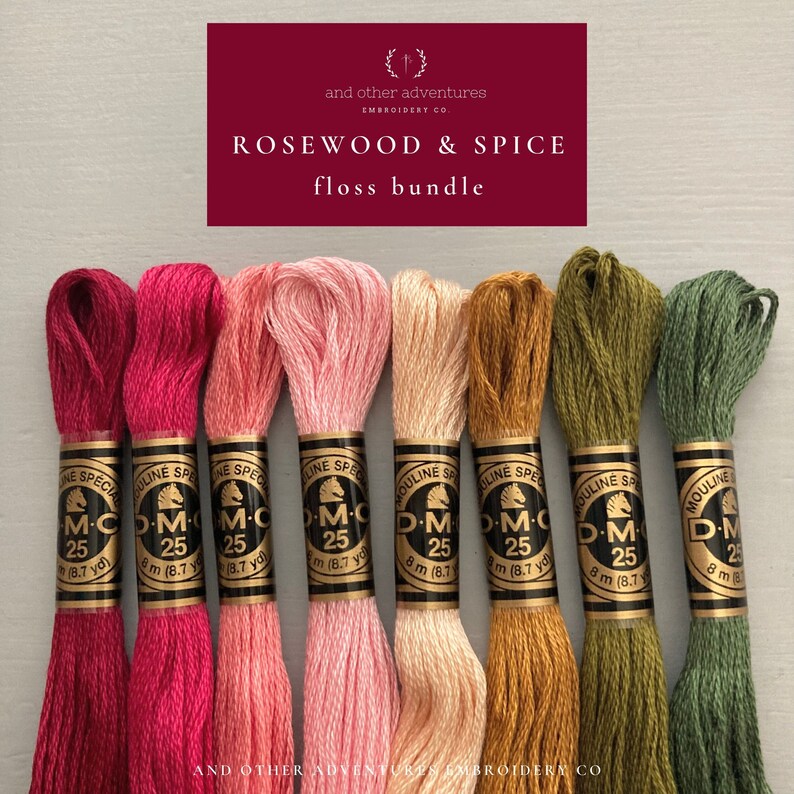 May include: A floss bundle called "Rosewood & Spice" from And Other Adventures Embroidery Co. The bundle includes eight skeins of embroidery floss in shades of pink, red, orange, and green. Each skein is labelled DMC 25 and 8 m (8.7 yd).