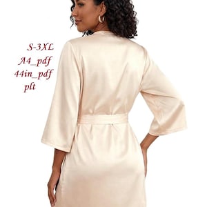 May include: A cream-colored satin robe with wide sleeves and a matching belt. The robe is knee-length and has a wrap-around design. Text on the image reads: S-3XL, A4_pdf, 44in_pdf, plt.