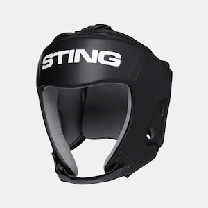 May include: Black boxing headgear with the word "STING" in white across the front. The headgear has a padded interior and ear holes. The headgear is designed to protect the head during boxing or other combat sports.