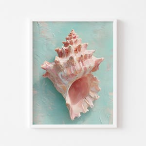 May include: A framed print of a conch shell painting. The shell, in shades of pink, is set against a light turquoise background. The artwork is presented in a white frame, evoking a seaside aesthetic. The painting's details are textured.