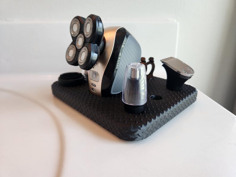 free bird shaver stand side view
freebird shaver stand
freebird organizer
head shaver holder
electric shaver stand
mens grooming organizer
razor holder stand
bald head shaver
bathroom organizer men
shaving station holder
mens gift idea
fathers day gift
3d printed organizer
bathroom counter decor