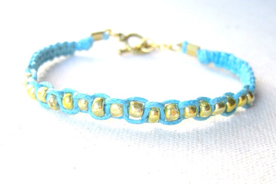 Items similar to Beaded Macrame Bracelet in Turquoise & Gold on Etsy