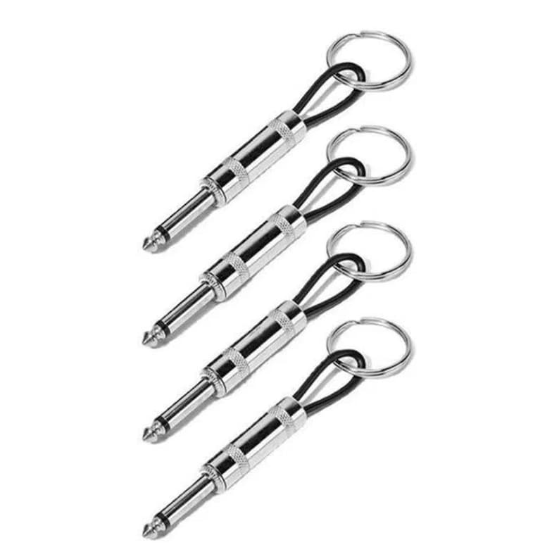 Puede incluir: Cuatro llaveros plateados con conector jack de audio, cada uno con un lazo negro y un conector jack de audio plateado. Los llaveros est&aacute;n dispuestos en diagonal sobre un fondo blanco. Los jacks son de 6,35 mm.