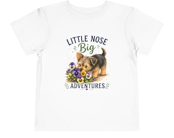 Camiseta infantil "Pequeno Nariz, Grandes Aventuras" com estampa de cachorrinho, perfeita para crianças que amam cachorros. Camiseta infantil fofa com estampa de cachorrinho e história em quadrinhos.