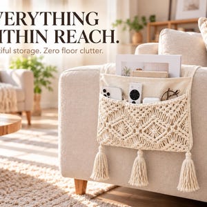 May include: A cream-colored macramé sofa armrest organizer featuring a diamond pattern, three bottom tassels, and multiple pockets holding a smartphone, remote control, and eyeglasses. The text "EVERYTHING WITHIN REACH. Beautiful storage. Zero floor clutter." is visible.