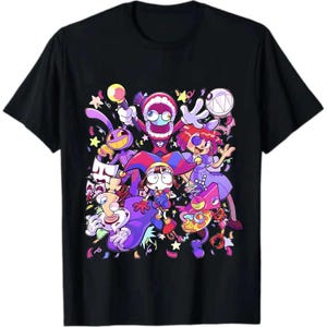 May include: A black short-sleeve t-shirt featuring a colorful graphic print of multiple cartoon characters, including a jester, a rabbit, and various abstract shapes, surrounded by scattered confetti and stars in a vibrant, multi-colored design.