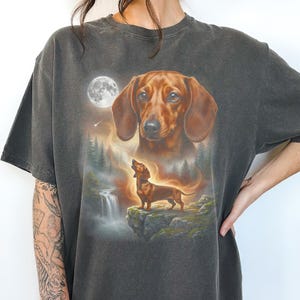 Double exposure artwork of a red smooth coat Dachshund face blending with night forest and full-body dog standing on a cliff.