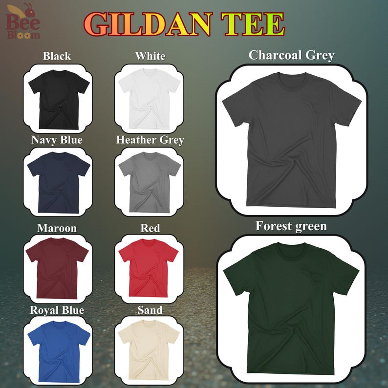 K&ouml;nnte beinhalten: Eine Auswahl an Gildan T-Shirts in verschiedenen Farben, darunter Schwarz, Wei&szlig;, Marineblau, Heather Grey, Bordeauxrot, Rot, K&ouml;nigsblau, Sand, Anthrazit und Waldgr&uuml;n. Jedes T-Shirt ist gefaltet und zeigt die verf&uuml;gbaren Farboptionen. Der Text "GILDAN TEE" ist ebenfalls abgebildet.