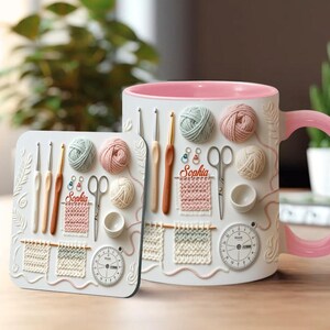 May include: White ceramic mug and coaster set with a pink interior and handle. The set features embossed crochet-themed designs, including yarn balls, crochet hooks, scissors, and a timer. The name "Sophia" is also included.