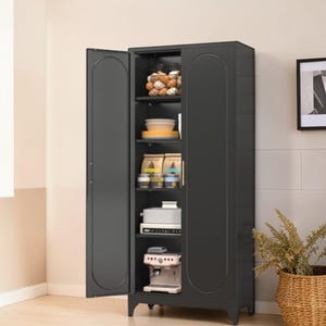 May include: A dark gray metal cabinet with an open door, revealing shelves stocked with kitchen items. The cabinet contains food items, a coffee maker, and other kitchen appliances. The cabinet is in a kitchen setting.