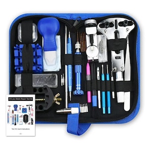 May include: A blue zippered case containing a 212-piece watch repair tool kit. The kit includes various tools like screwdrivers, pliers, and watch case openers. A small instruction booklet is also included.