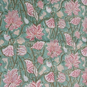 Hand Block Printed Cotton Fabric in Soft Teal Green with Traditional Floral and Botanical Motifs, Indian Handmade Textile for Sewing, Quilting, Clothing, Home Decor and Craft Projects
Beautiful Teal Green Hand Block Print Fabric with Large Red and White Floral Flowers, Botanical Leaves and Delicate Traditional Indian Motifs, Artisan Cotton Textile for Sewing and DIY Projects
Traditional Indian Hand Block Printed Fabric Featuring Floral Vine, Leaf and Flower Motifs on a Teal