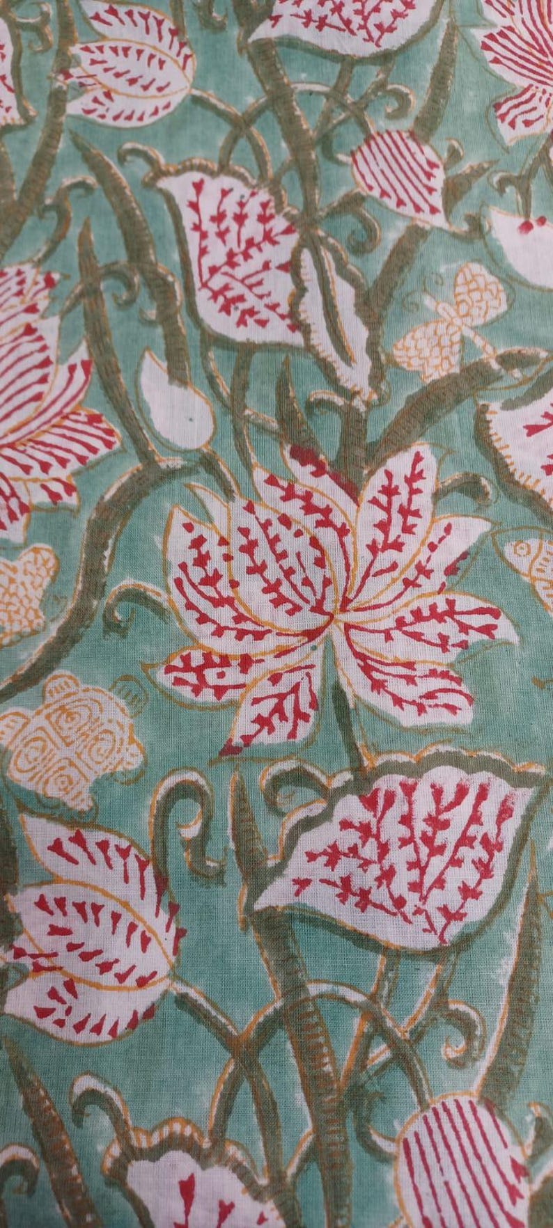 Handmade Indian floral upholstery fabric
Luxury Indian Floral Cotton Fabric by the Yard with Hand Block Print Design, Red Botanical Flowers and Elegant Vine Pattern for Upholstery, Quilting, Curtain Making and Cushion Cover Sewing.
Botanical Hand Block Print Cotton Fabric with Traditional Indian Red Floral Pattern on Green Background, Perfect for Quilting Fabric, Sewing Material, Craft Supplies and Home Textile Projects.
