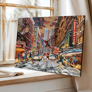 May include: A canvas print depicting a vibrant cityscape scene with superheroes in action. The artwork showcases a bustling street with cars, buildings, and neon signs, including "Hotel New York." A superhero in a red suit is mid-air, while others engage in combat.