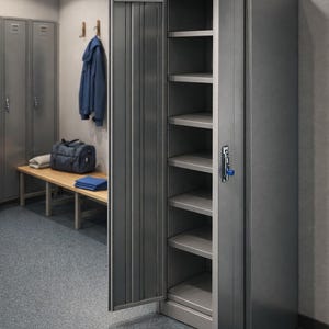 May include: A gray metal locker with an open door revealing multiple shelves. The locker has a vertical ribbed design on the door. A blue key is in the lock. The background shows a bench, coat rack, and other lockers.