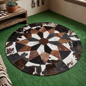 May include: A circular rug constructed from stitched cowhide patches in a geometric star pattern. The design features alternating segments of solid black, solid brown, and white-and-brown spotted hide, centred with a solid brown circle.