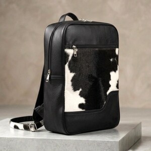 Unisex Cowhide Leather Backpack | Handmade Black Leather Bag for Men and Women | Western Hair on Hide Laptop Daypack | Travel Rucksack