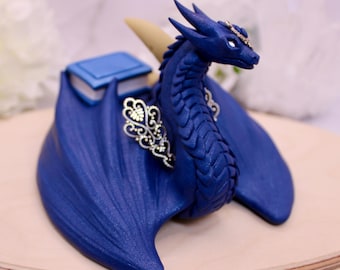 Scultura di drago, guardiano, creatura fantastica