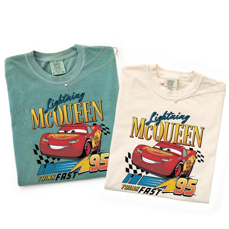 May include: A set of three ceramic mugs with a speckled, matte finish. Each mug features a different color: light blue, cream, and gray. The mugs have a simple, modern design with a rounded shape and a handle.