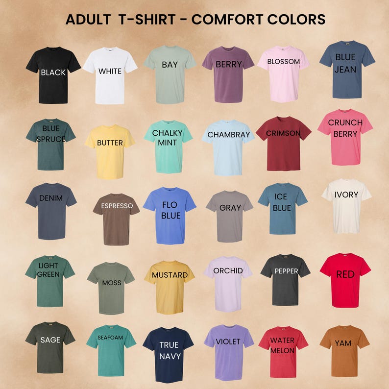 May include: A color chart for adult Comfort Colors t-shirts featuring thirty short-sleeve shirts in various shades including black, white, bay, berry, blossom, blue jean, blue spruce, butter, chalky mint, chambray, crimson, crunch berry, denim, espresso, flo blue, gray, ice blue, ivory, light green, moss, mustard, orchid, pepper, red, sage, seafoam, true navy, violet, watermelon, and yam.