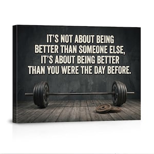 May include: Canvas art print featuring a barbell with weight plates on a wooden floor. The artwork displays the motivational quote: "IT'S NOT ABOUT BEING BETTER THAN SOMEONE ELSE, IT'S ABOUT BEING BETTER THAN YOU WERE THE DAY BEFORE."