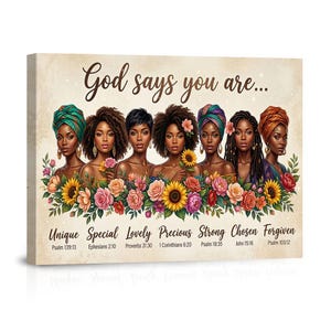 May include: A canvas print featuring seven Black women adorned with floral head wraps and flowers. The text "God says you are..." is above them, with words like "Unique" and "Special" below. The artwork is framed and ready to hang.