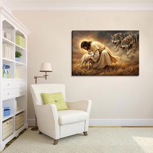 May include: A canvas print depicts a religious scene with a figure in a cream-colored robe cradling a lamb in a field of tall grass. Two wolves are in the background. The artwork has a warm, golden color palette.