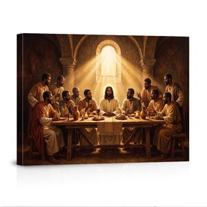 May include: A canvas print depicting a group of thirteen individuals with dark skin tones gathered around a long wooden table for a meal. The central figure sits beneath a bright arched window, with others wearing robes in shades of brown and tan.
