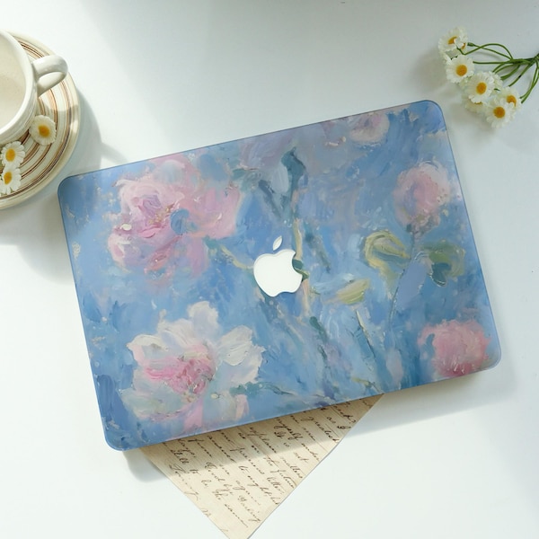 May include: A laptop hard shell case featuring an impressionistic oil painting design with soft pink floral blooms set against a textured light blue background, complete with a central cutout revealing the silver Apple logo on the device.