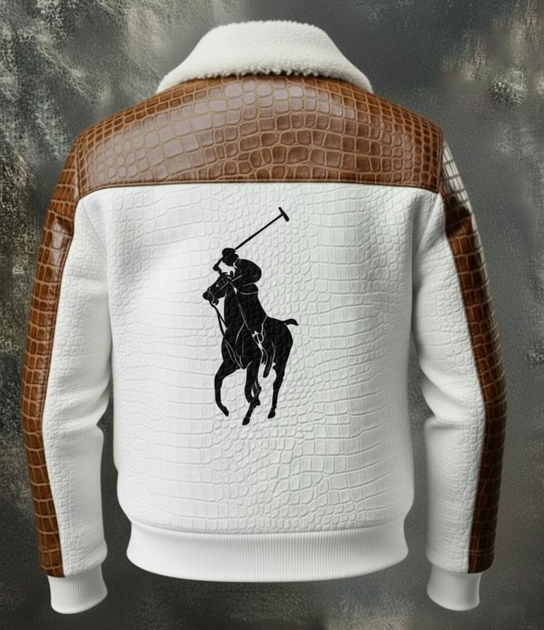 May include: White jacket with brown faux-crocodile accents on the shoulders and sleeves. Features a white faux-crocodile textured back panel with a black polo player logo. The collar is white and fluffy.