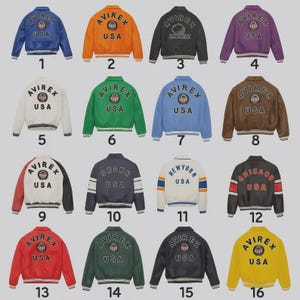 May include: A collection of sixteen bomber jackets in various colors, including blue, orange, black, purple, white, green, brown, red, and yellow. Each jacket features the "AVIREX USA" logo on the front and back, with some jackets displaying city names.