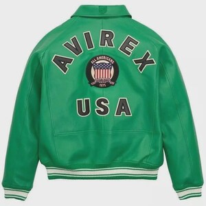 May include: A green leather jacket with the word "AVIREX" arched across the shoulders. Below the word is a circular patch with the words "ALL AMERICANS ESTABLISHED 1975" and a US flag design. The word "USA" is below the patch. The jacket has a white and black striped hem.