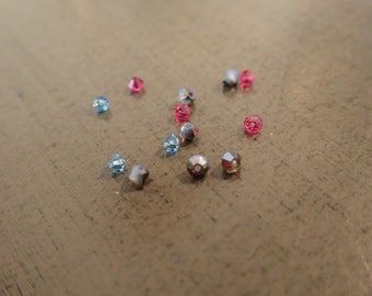 Lot of Assorted 1mm Swarovski Crystal Bicones