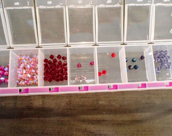 Lot of Assorted 6mm Pinks and Purples Swarovski Crystal Bicones