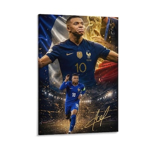 May include: A vertical poster featuring a footballer in a blue jersey with the number 10, set against a backdrop of a stadium and a French flag. The player is shown in a large upper portrait and a smaller running pose, with a gold signature overlay.