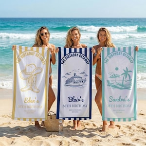 May include: Three personalized beach towels with the text "The Birthday Getaway" are held up on a beach. One towel is white with yellow stripes and a cowboy boot graphic. The second is white with blue stripes and a cruise ship graphic. The third is white with teal stripes and a beach scene graphic.
