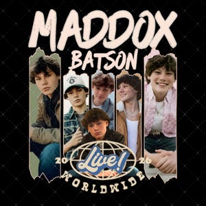 May include: Black t-shirt featuring the name "MADDOX BATSON" in a distressed, off-white font. The design includes multiple images of a young man, with the words "Live! Worldwide" and the years "2026" in a blue and white globe graphic.