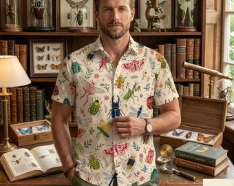 May include: A short-sleeved button-down shirt in a cream color featuring a colorful, repeating pattern of various insects, including beetles, moths, and dragonflies, interspersed with small floral elements and green foliage.