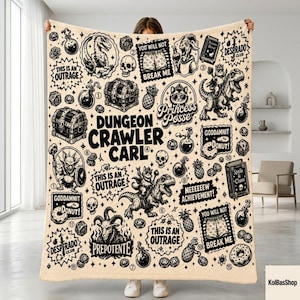 May include: A cream-colored throw blanket featuring a black ink-style print with the text Dungeon Crawler Carl. The design includes illustrations of dinosaurs, skulls, treasure chests, potions, donuts, and text boxes reading This Is An Outrage.