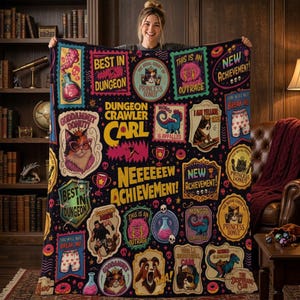 May include: A black fleece blanket featuring a colorful collage of Dungeon Crawler Carl graphics, including text like 'Best in Dungeon', 'New Achievement', and 'Princess Donut', alongside illustrations of cats, a dinosaur, and potions.