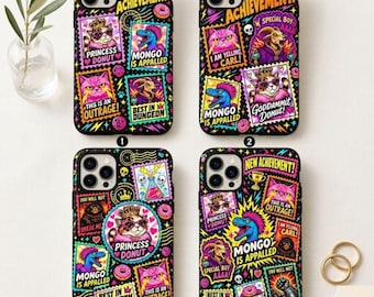 May include: Four black smartphone cases featuring vibrant, colorful sticker-style graphics. Designs include cats wearing crowns, a blue dinosaur, a goat, and text such as NEW ACHIEVEMENT, PRINCESS DONUT, MONGO IS APPALLED, and THIS IS AN OUTRAGE.