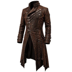 May include: A brown, distressed-finish long coat featuring a high collar, multiple silver-toned metal buckles, and decorative studs across the chest. The garment has long sleeves with buckled cuffs and an asymmetrical, pointed hemline design.