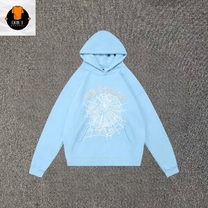 May include: A light blue hooded sweatshirt featuring a white spiderweb graphic printed on the center chest. The hoodie includes a front kangaroo pocket, long sleeves with ribbed cuffs, and a matching ribbed hem, providing a consistent color palette.