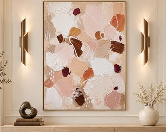 Puede incluir: Un cuadro rectangular sobre lienzo con pinceladas de impasto gruesas y texturizadas en tonos blanco, crema, rosa suave, terracota y burdeos intenso. La composición abstracta muestra formas orgánicas y redondeadas sobre un fondo neutro.