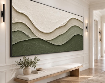 May include: A large rectangular wall art piece featuring a textured, layered landscape design in shades of cream, sage green, and dark olive green. The artwork has a thick, impasto-style application of paint creating wavy, horizontal ridges.