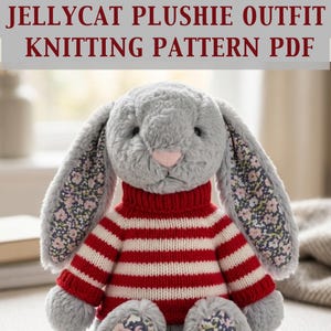 May include: A gray plush bunny wearing a red and white striped sweater. The bunny has long ears with a floral pattern on the inside. The text "JELLYCAT PLUSHIE OUTFIT KNITTING PATTERN PDF" is at the top of the image.