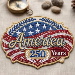 May include: An embroidered patch featuring a stylized American flag design with a blue field of white stars, red and white stripes, and gold laurel branches. The text reads America 250 Years in gold and blue lettering with a gold border.