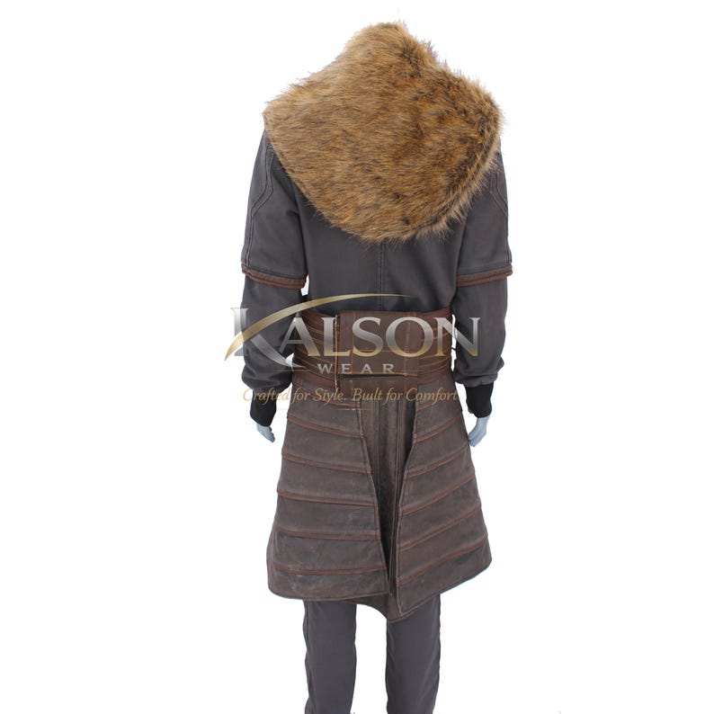 May include: A gray coat with a brown fur collar and a brown leather belt. The coat has brown leather accents on the sleeves and a brown leather skirt. The text "ALSON WEAR" is visible on the coat.