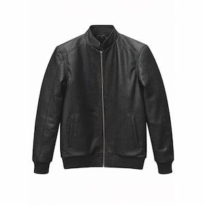 May include: A white ceramic mug with a black handle and the text "But First, Coffee" in a black, bold font. The mug is on a white surface.