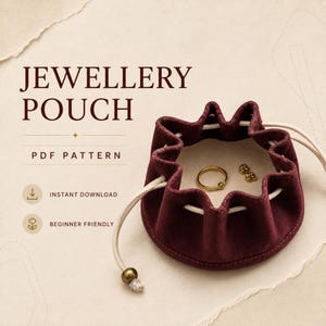 May include: A deep burgundy velvet drawstring jewellery pouch with a circular base and scalloped top edge, featuring a light-coloured cord with a metallic bead. The text reads JEWELLERY POUCH, PDF PATTERN, INSTANT DOWNLOAD, and BEGINNER FRIENDLY.